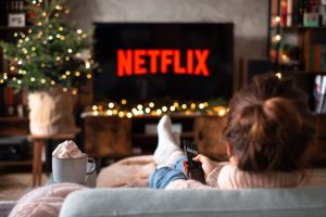 Read more about the article Capturing Childhood Magic: A Little Girl’s Delightful Evening on the Couch with Netflix